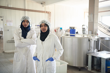 Image showing business woman team in local cheese production company