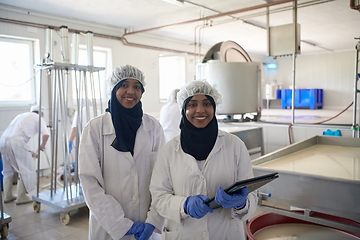 Image showing business woman team in local cheese production company