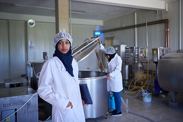 Image showing business woman team in local cheese production company