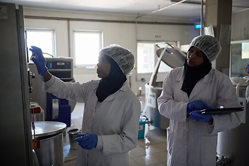 Image showing business woman team in local cheese production company