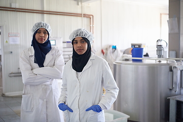 Image showing business woman team in local cheese production company