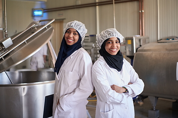 Image showing business woman team in local cheese production company