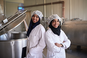 Image showing business woman team in local cheese production company