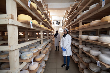 Image showing business woman team in local cheese production company