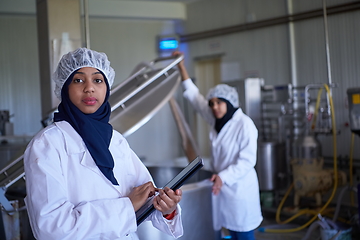 Image showing business woman team in local cheese production company