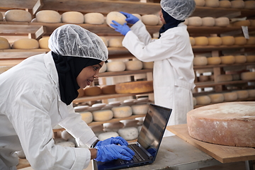 Image showing business woman team in local cheese production company