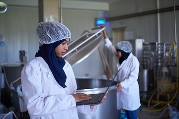 Image showing business woman team in local cheese production company