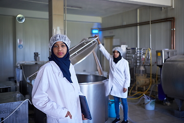 Image showing business woman team in local cheese production company