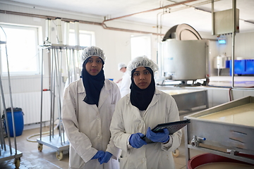 Image showing business woman team in local cheese production company