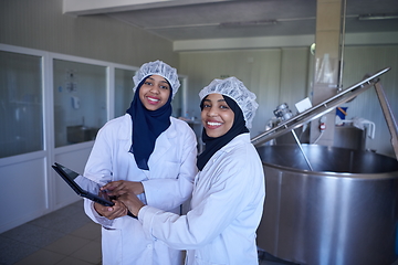 Image showing business woman team in local cheese production company