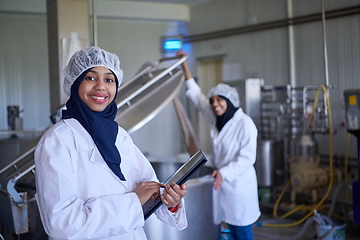 Image showing business woman team in local cheese production company