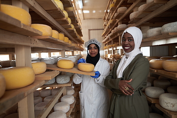 Image showing business woman team in local cheese production company