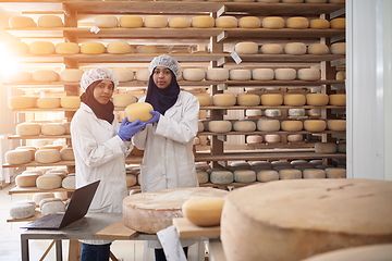 Image showing business woman team in local cheese production company