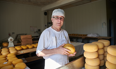 Image showing Cheese maker at local production factory