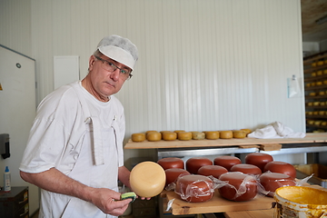 Image showing Cheese maker at local production factory