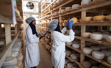 Image showing business woman team in local cheese production company