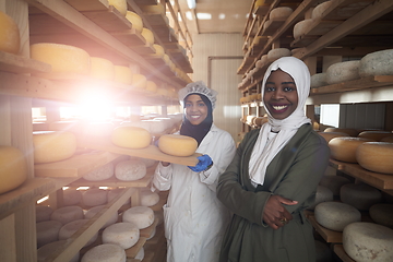 Image showing business woman team in local cheese production company