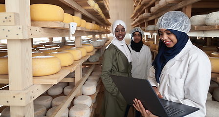 Image showing business woman team in local cheese production company