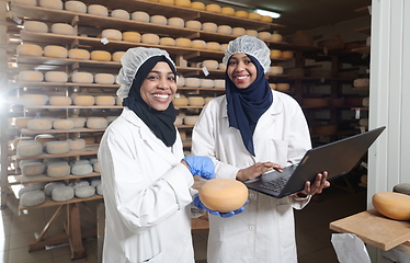 Image showing business woman team in local cheese production company