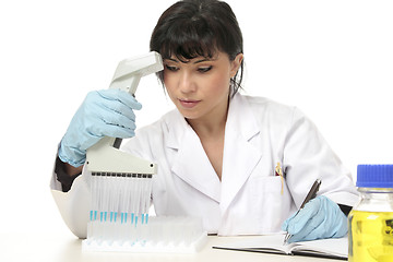 Image showing Scientist documenting lab results