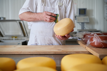 Image showing Cheese maker at local production factory