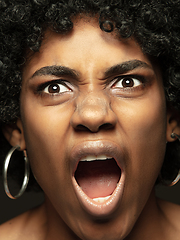 Image showing Close up portrait of young african-american emotional girl