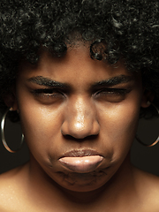 Image showing Close up portrait of young african-american emotional girl