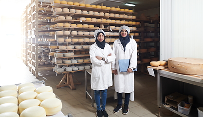 Image showing business woman team in local cheese production company