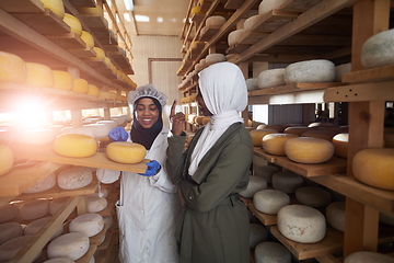 Image showing business woman team in local cheese production company