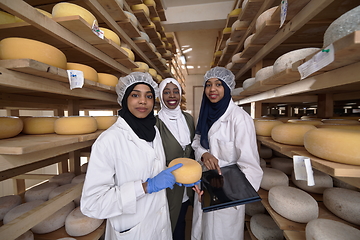 Image showing business woman team in local cheese production company