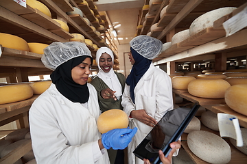 Image showing business woman team in local cheese production company