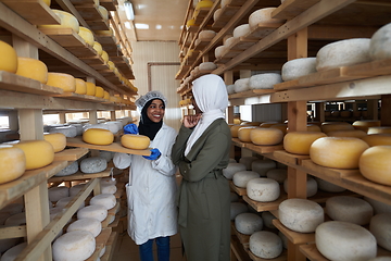 Image showing business woman team in local cheese production company