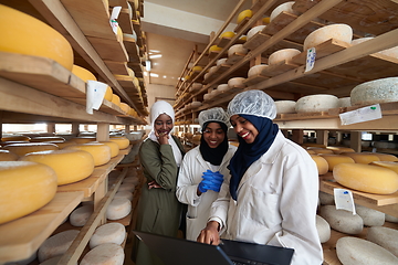 Image showing business woman team in local cheese production company