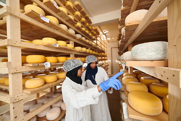 Image showing business woman team in local cheese production company