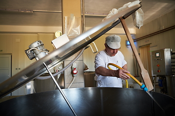 Image showing Cheese maker at local production factory