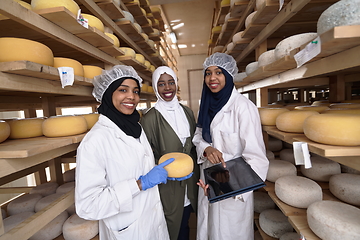 Image showing business woman team in local cheese production company