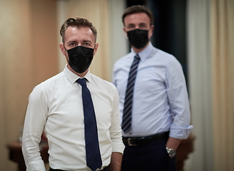 Image showing business team wearing crona virus protection face mask