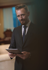 Image showing business man using tablet computer