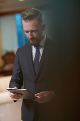 Image showing business man using tablet computer