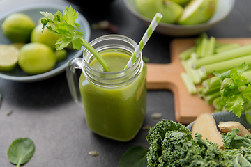 Image showing close up of glass mug with green vegetable juice