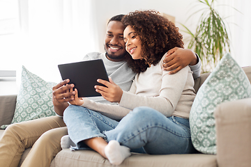 Image showing african american couple with tablet pc at home