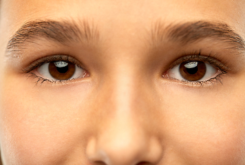 Image showing close up of teenage girl face with brown eyes