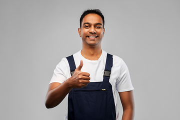 Image showing happy indian worker or builder showing thumbs up