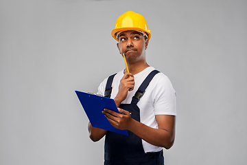 Image showing thinking builder with clipboard and pencil