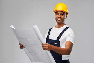 Image showing happy indian builder in helmet with blueprint