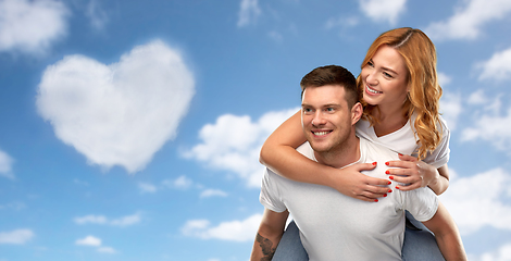 Image showing happy couple in white t-shirts having fun