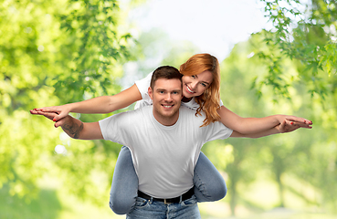 Image showing happy couple in white t-shirts having fun