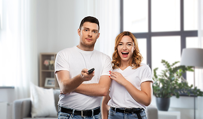 Image showing couple with tv remote control