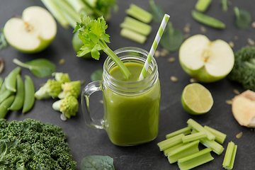 Image showing close up of glass mug with green vegetable juice