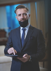 Image showing business man wearing protective face mask at office